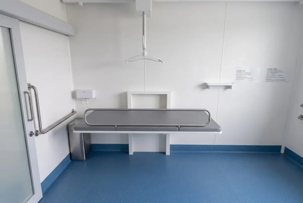Concept render of the Fortitude Essentials Essential Access Pod, adult change room, change table and ceiling hoist.